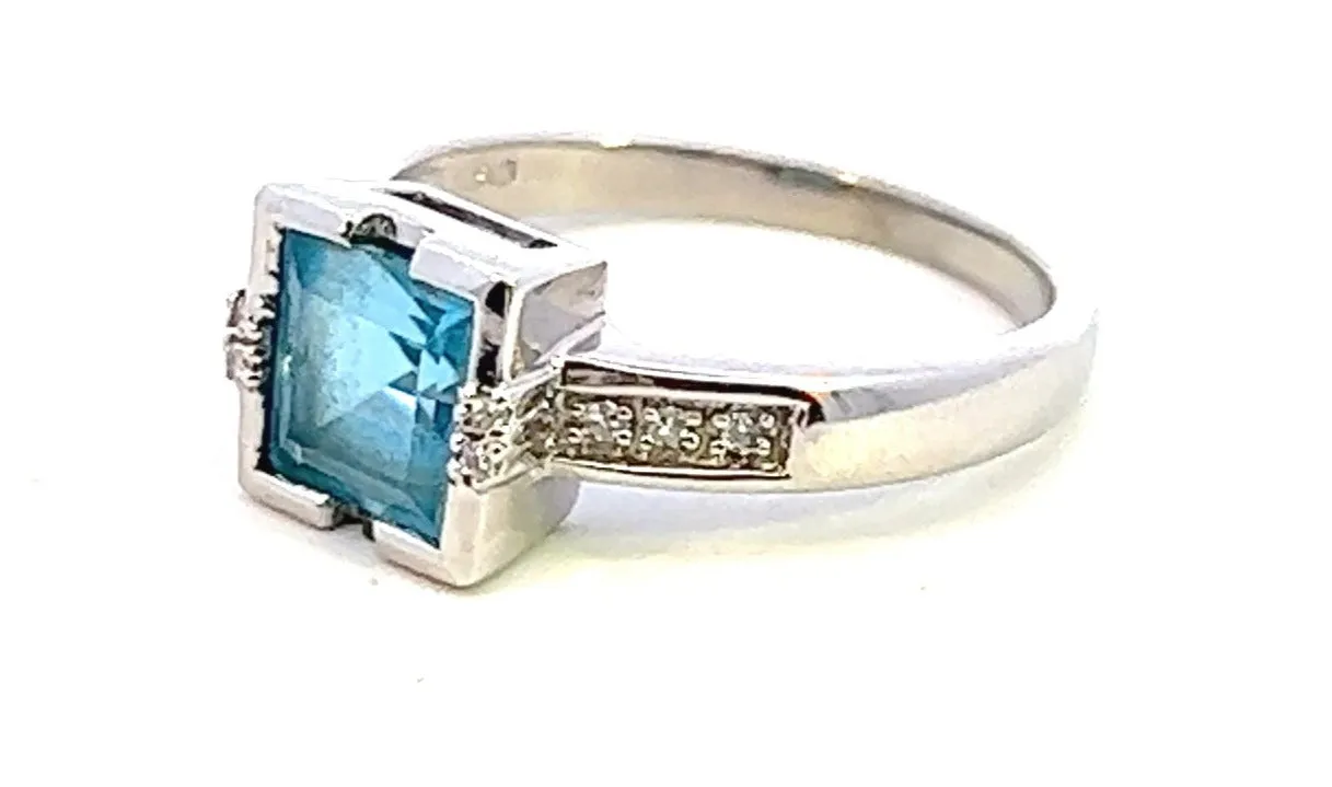 Exquisite White Gold Blue Topaz & Diamond Ring