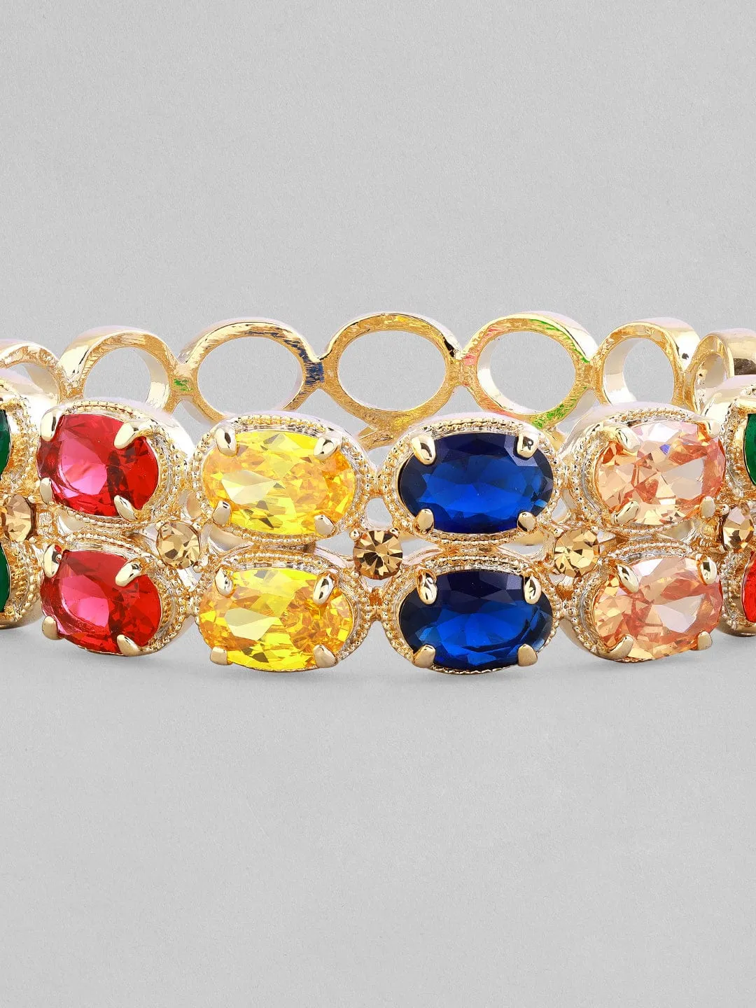Rubans gold plated bracelet with multicoloured circular shaped stones.